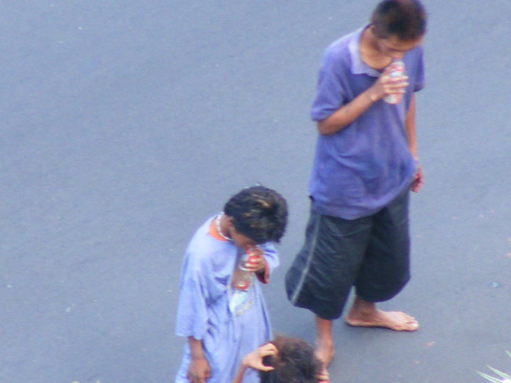 Street kids Huffing Shoe Polish