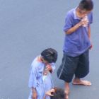 Street kids Huffing Shoe Polish