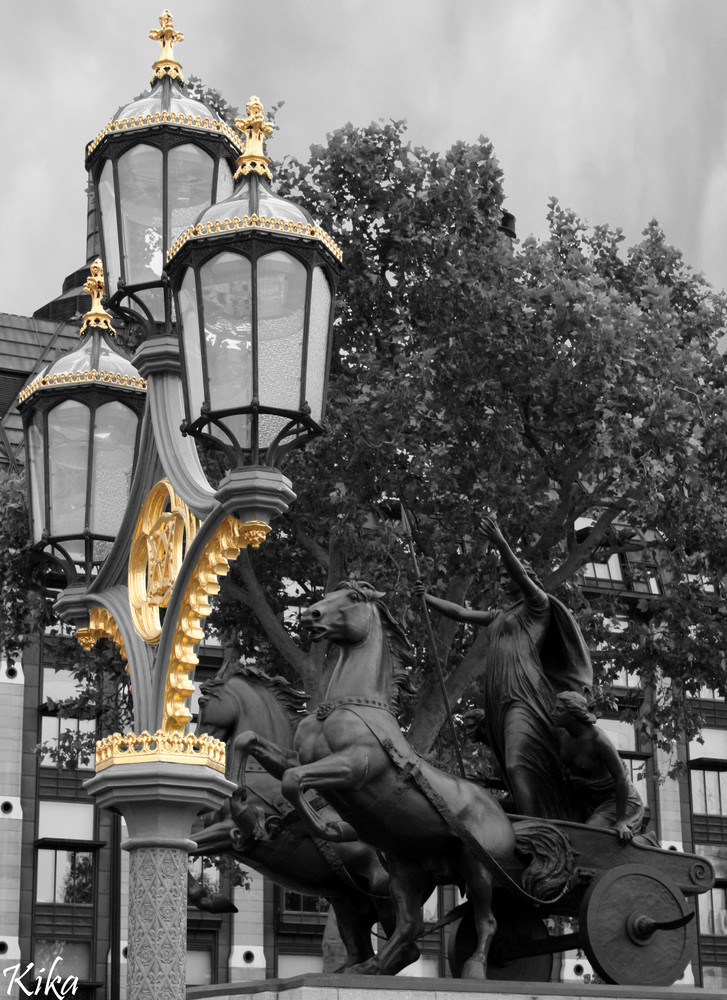 Street lamp and statue