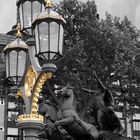 Street lamp and statue