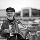 street musician "Columbo", alias Werner Hartmann at Warnemünde "Alter Strom"