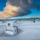 Stürmischer Sonnenuntergang am Strand von Norddorf