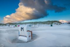 Stürmischer Sonnenuntergang am Strand von Norddorf