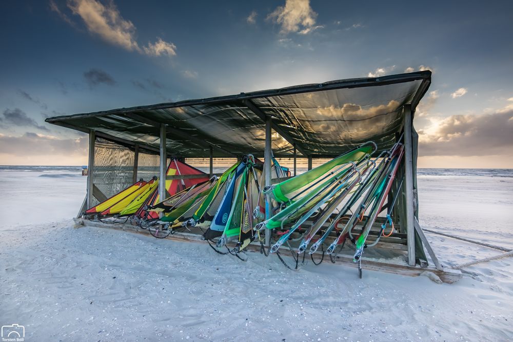 Stürmischer Sonnenuntergang am Strand von Norddorf