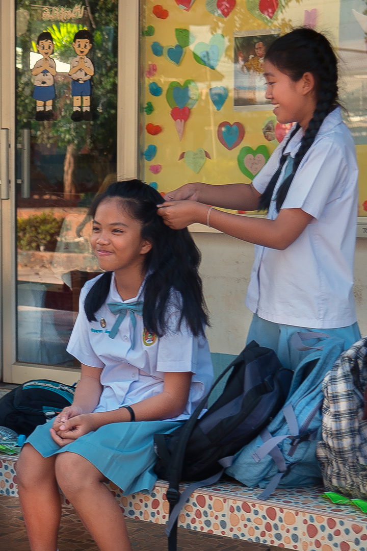 Styling a student's hair