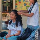 Styling a student's hair