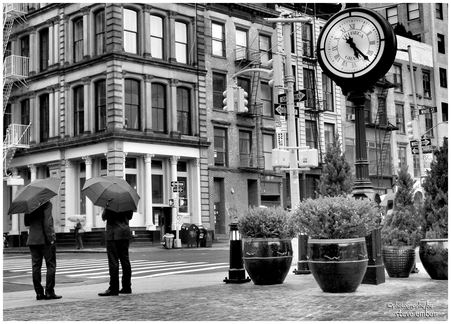 Suits in Drizzle and a Grand Clock - a Tribeca Moment