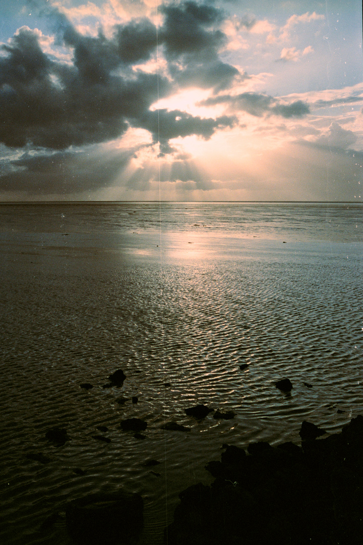 Sun and clouds at the wadden sea