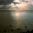 Sun and clouds at the wadden sea