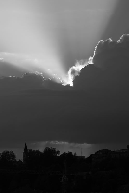 Sun behind the clouds