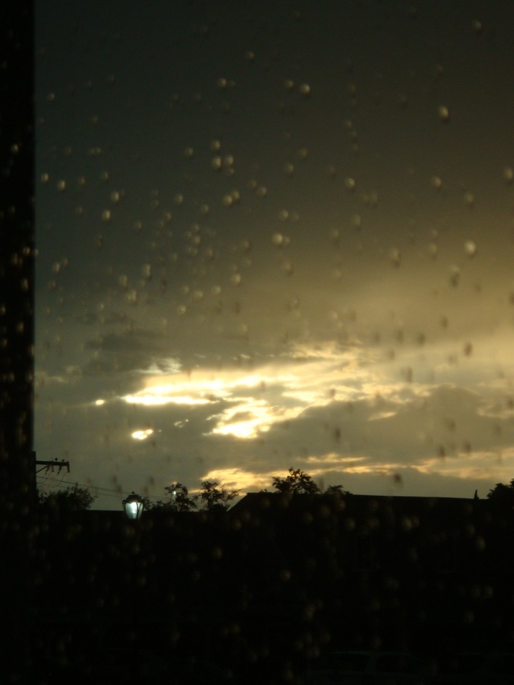 sun breaks through the sky after a tornado in st. louis