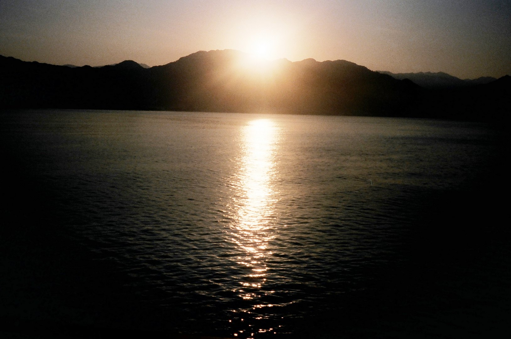 Sun is setting over Catalina Island, California