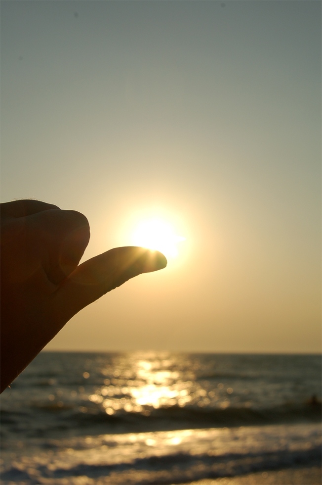 sun on finger