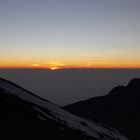 Sun Rise, the lonely hiker and the summit of Africa