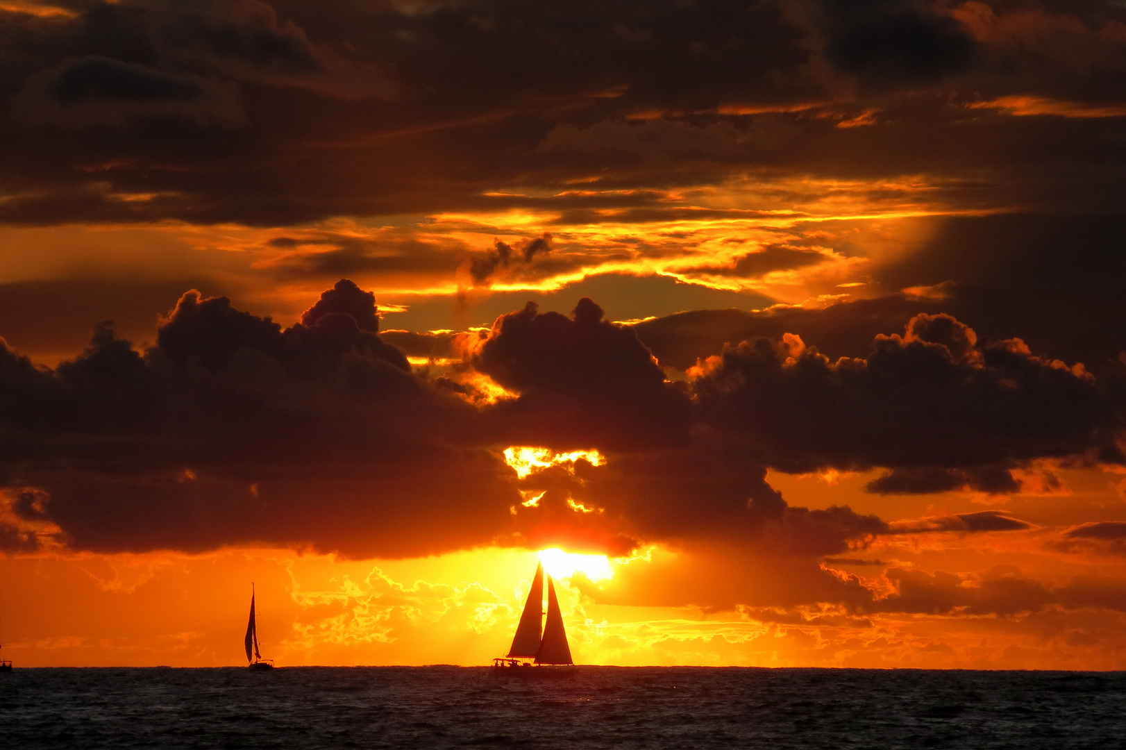 sun, sailboat and clouds