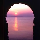 Sun set thru old castle windows