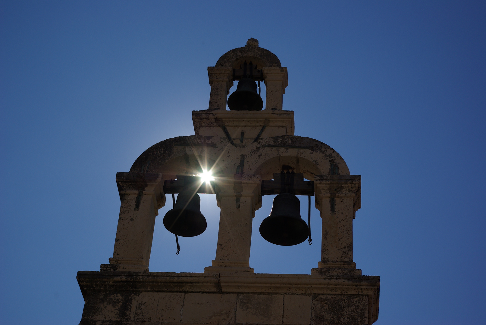 Sun through the belfry. Dubrovnik, Croatia.