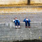 Sunbathing on the banks of the Seine.