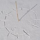 Sunclock on hard crust of snow