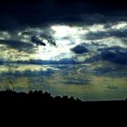  Sunrays piercing  thru the Stormy Dark Clouds