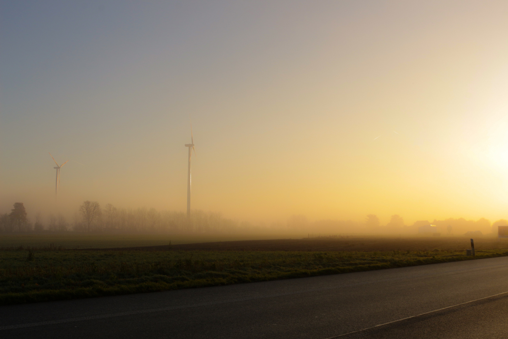 Sunrise And Fog