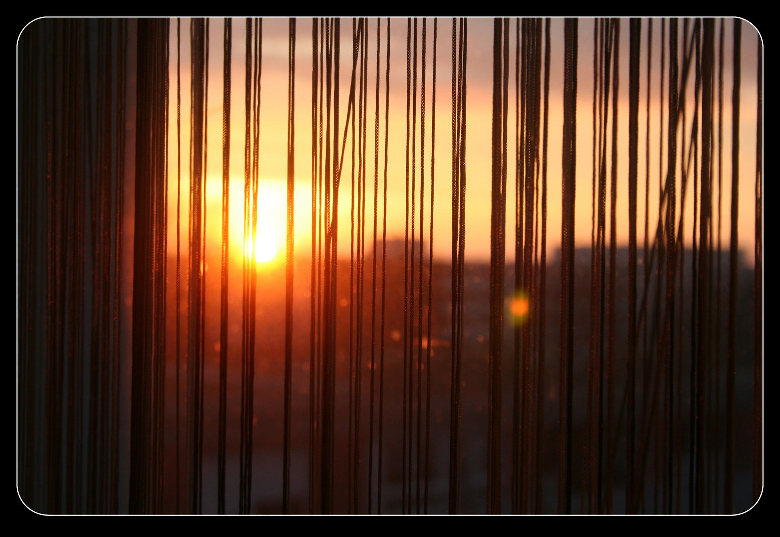 Sunrise behind a Window