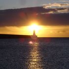 sunrise behind lighthouse in Newcastle upon Tyne