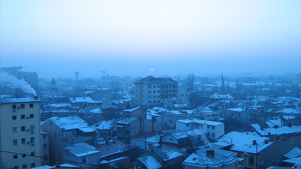 sunrise in frozen city