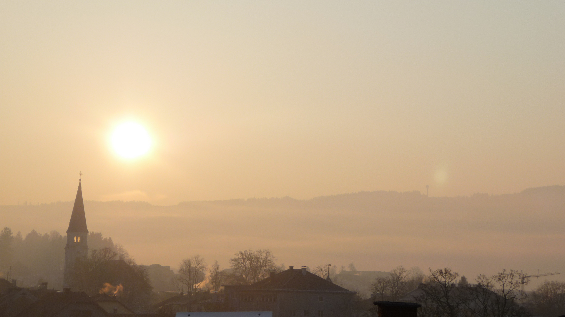 Sunrise over church at Oberndorf, Austria