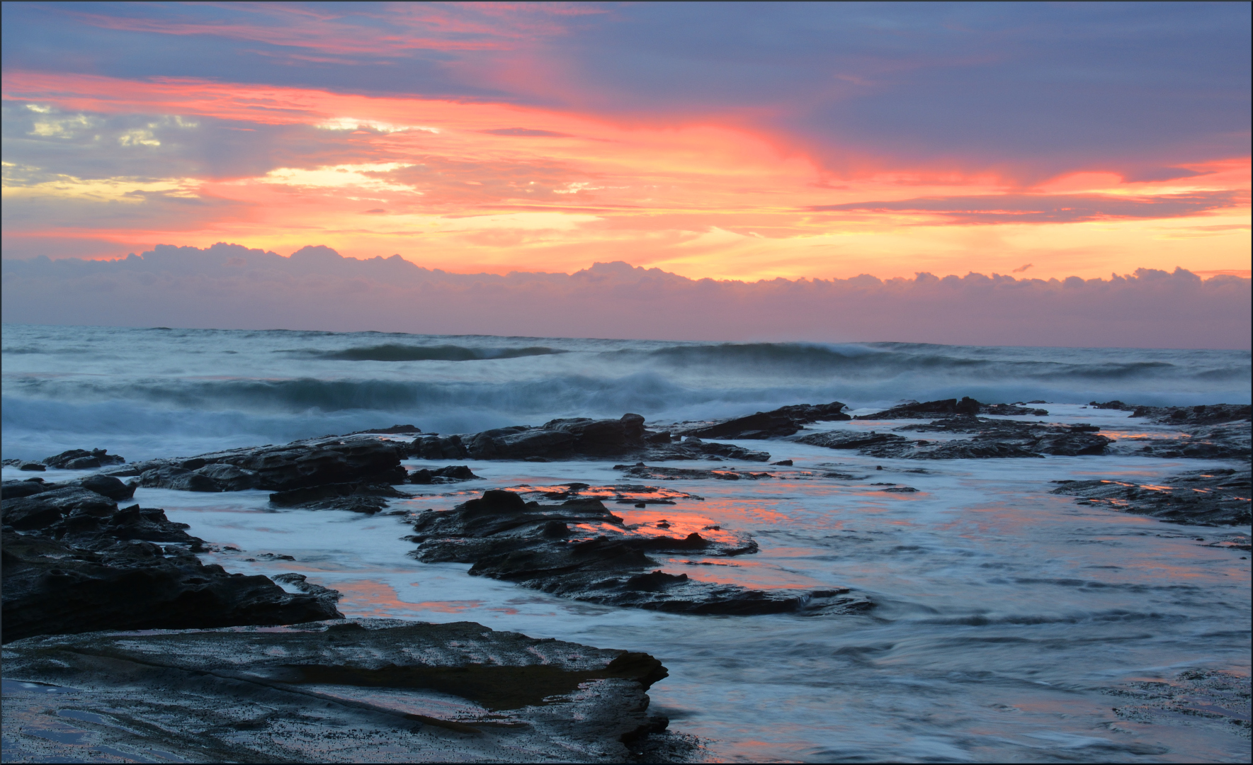 Sunrise with sea and clouds