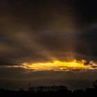 Sunset And Dark Clouds