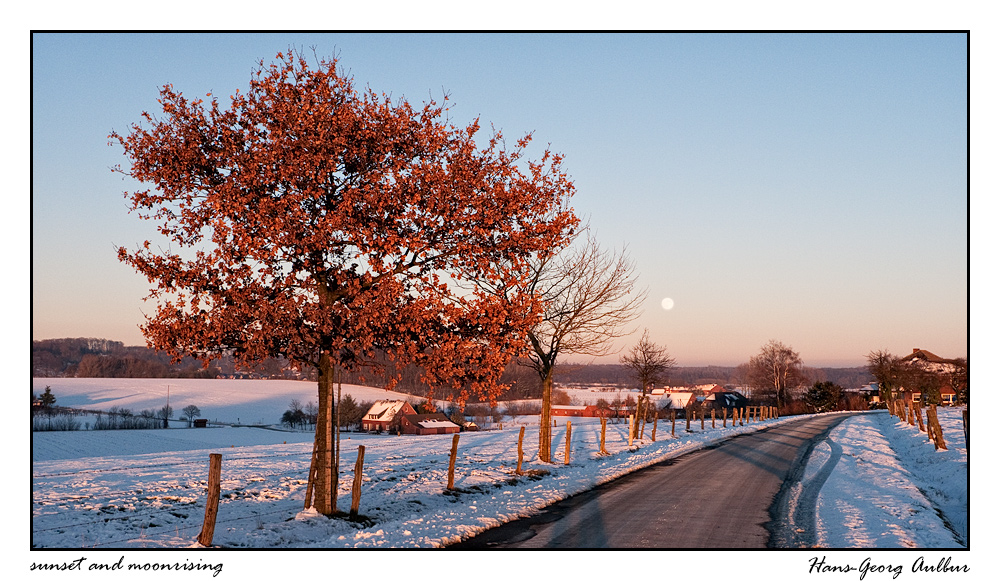 sunset and moonrising