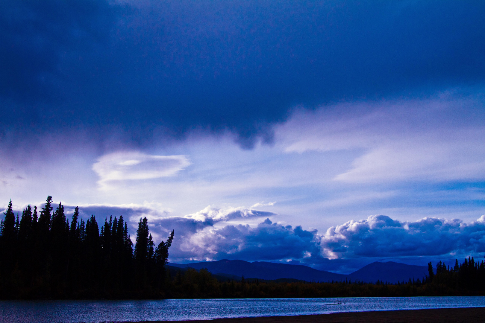 sunset at Nisutlin River, Yukon Territory, Canada