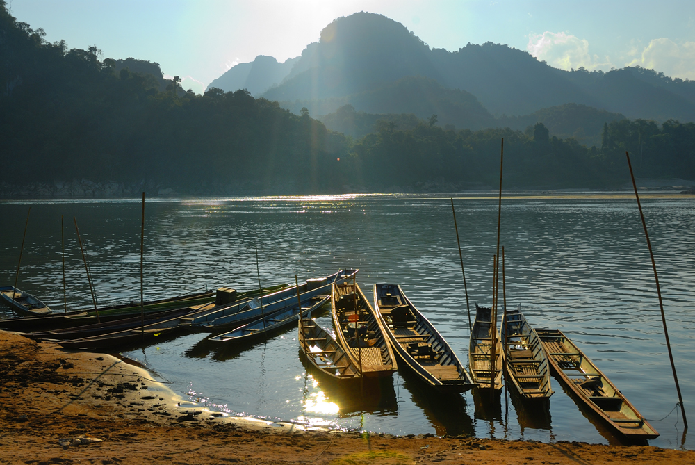 Sunset atmosphere at the river mouth Nam Ou into the Mekong