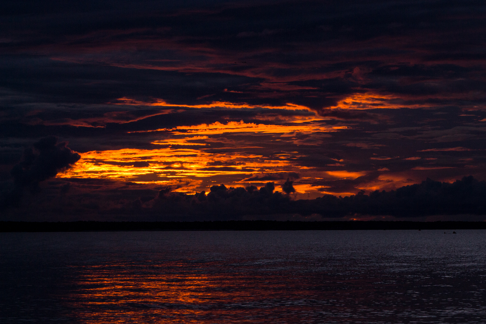 Sunset behind the clouds