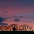 sunset behind the hill