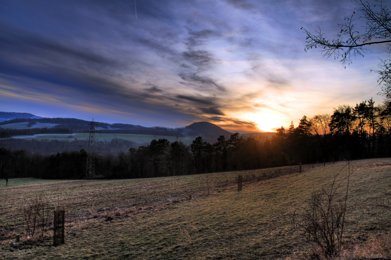 sunset behind the hills