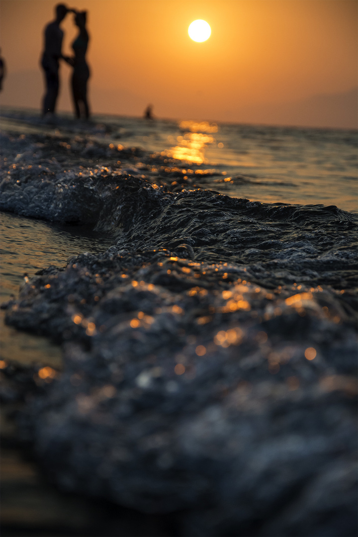 Sunset in Greece and the happy cuple