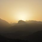 Sunset in the Alps shining trough the sand from Sahara 