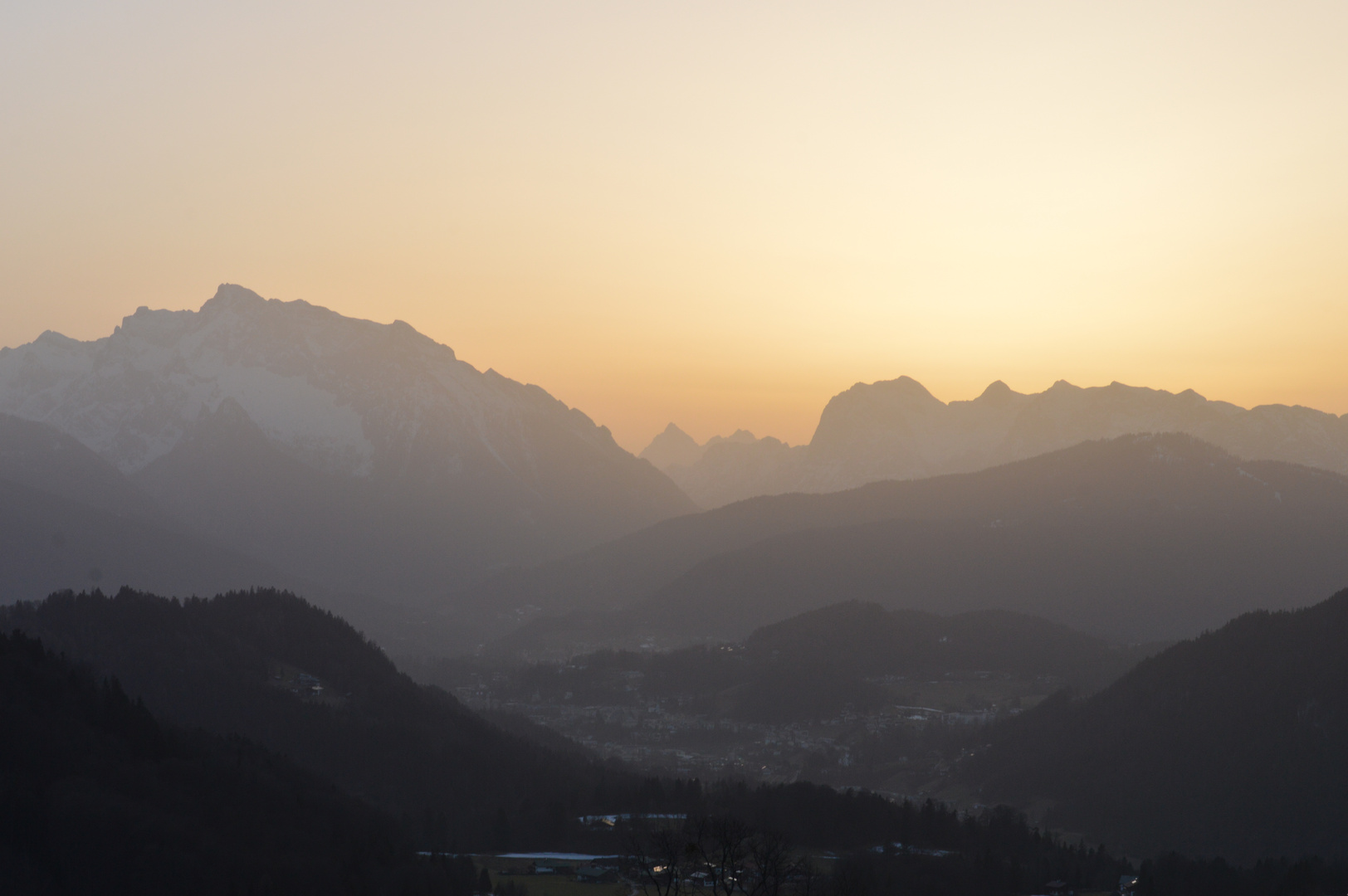 Sunset in the Alps shining trough the sand from Sahara 