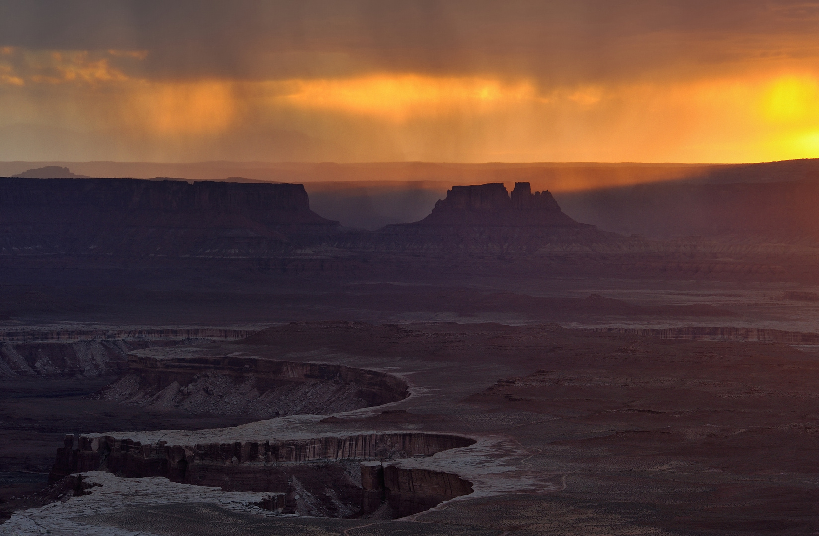 *sunset  monsoon over canyonlands*