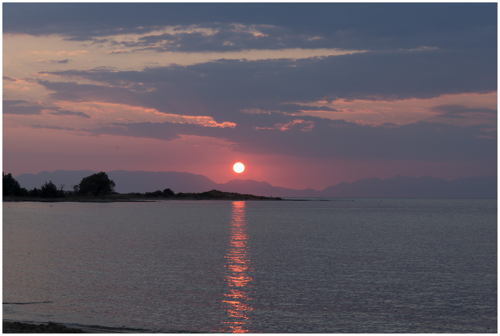 Sunset on the waterfront to Elafonissos Island