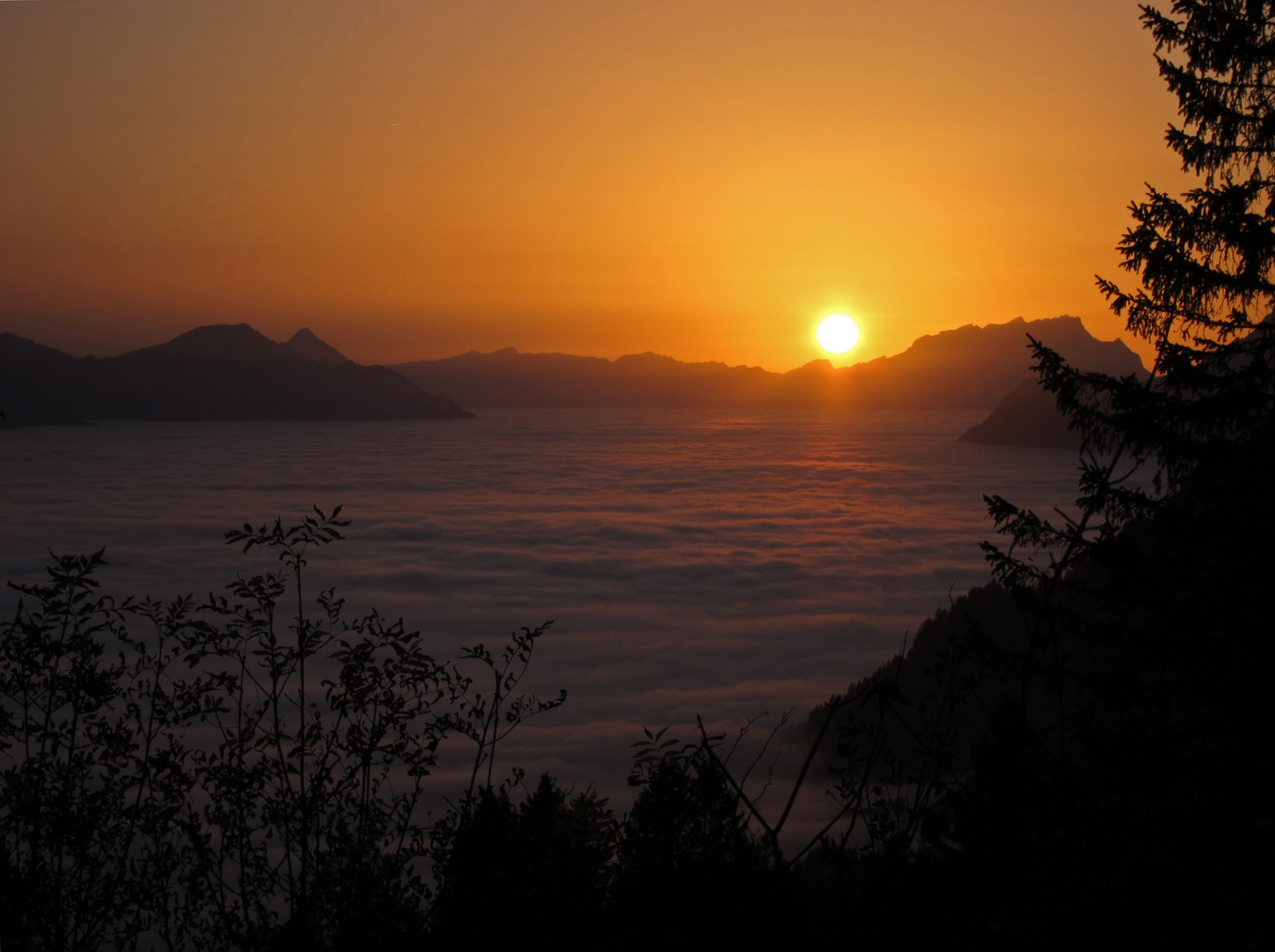 Sunset over a misty Lake Lucerne, Switzerland