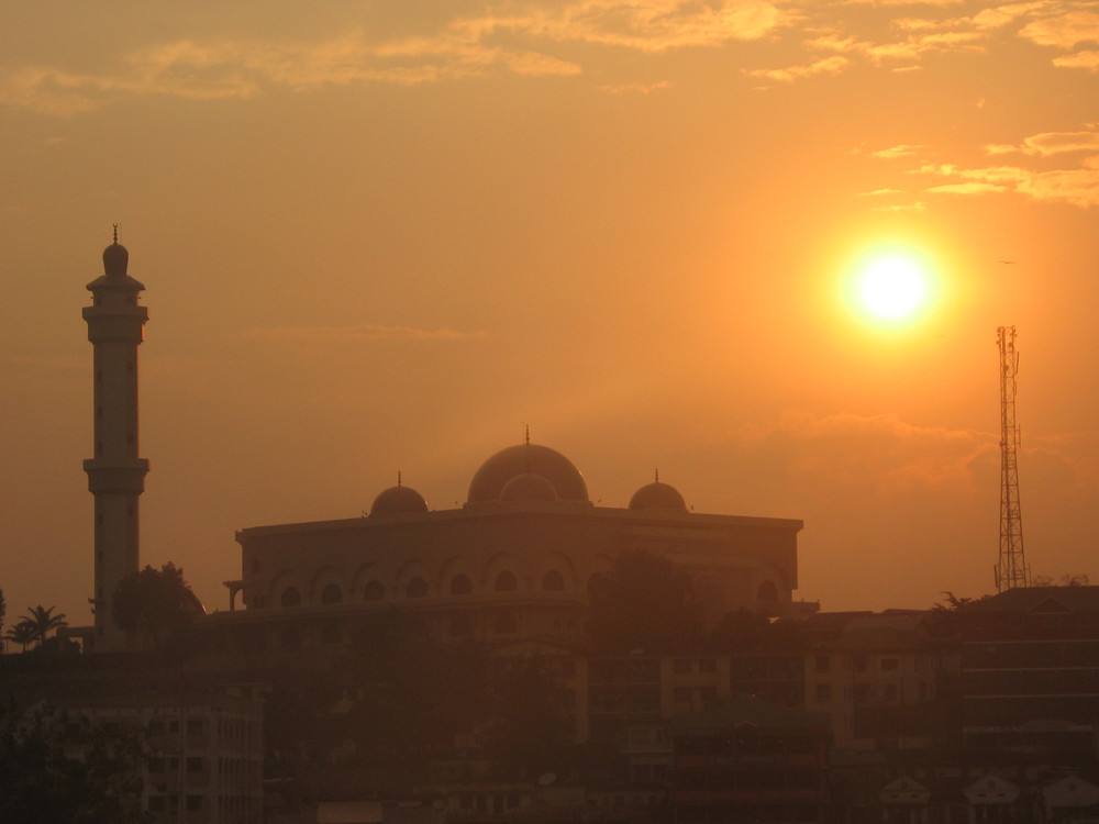 Sunset over a mosque in Uganda