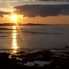 sunset over bamburgh castle