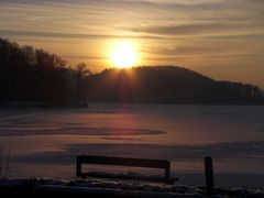 Sunset over frozen Schieder-Lake