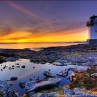 Sunset over Rhue Lighthouse