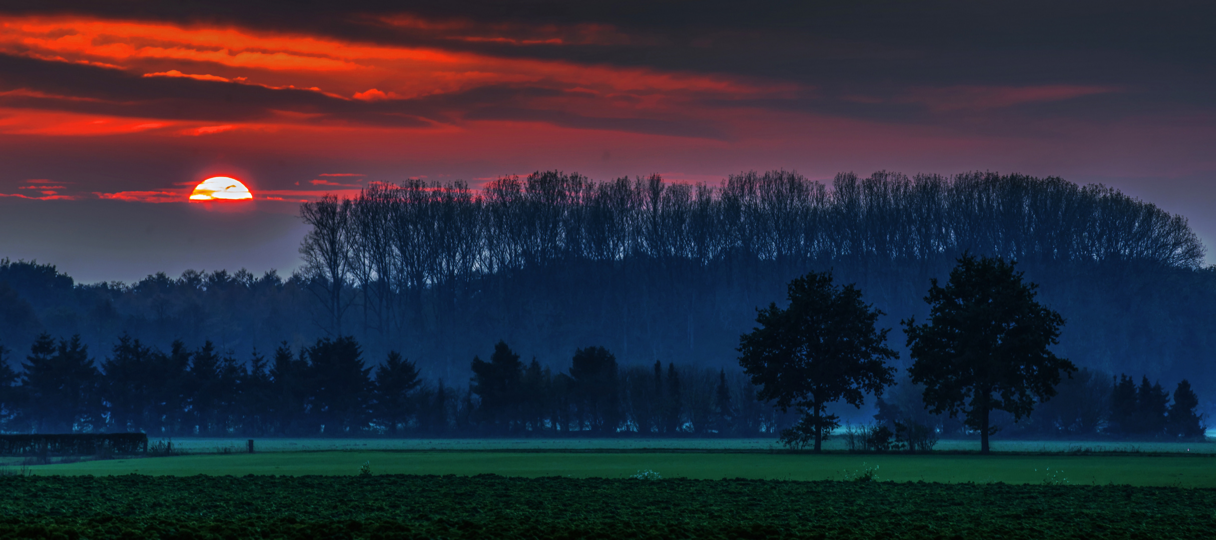 Sunset over the fields of Grütlohn