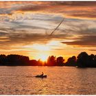 Sunset over the lake of Nieuwkapelle.