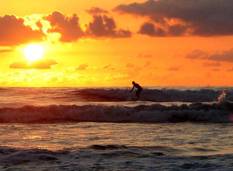 sunset surfing